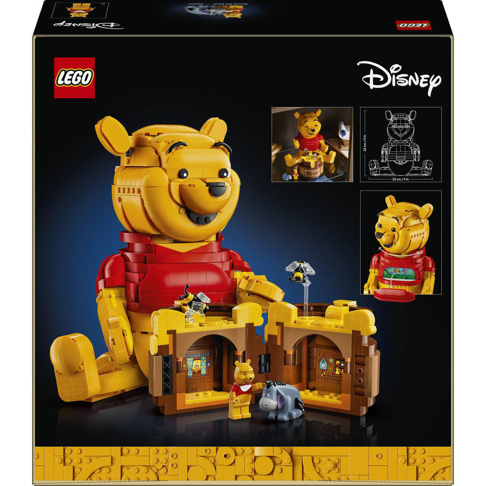 Ein Lego-Set mit Winnie Puuh, Ferkel und Uhu vor einem Bienenstock.