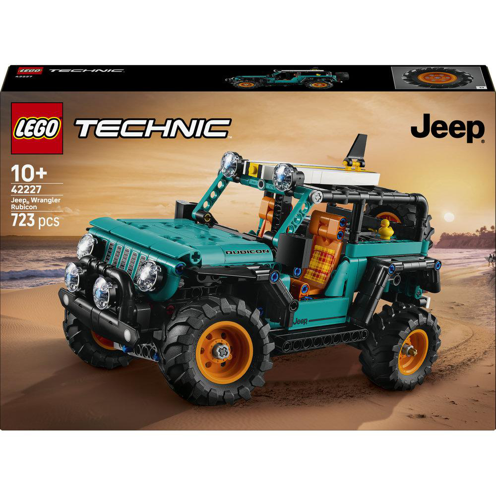 Ein grüner Lego Technic Jeep Wrangler Rubicon mit orangenen Felgen steht auf Sand.