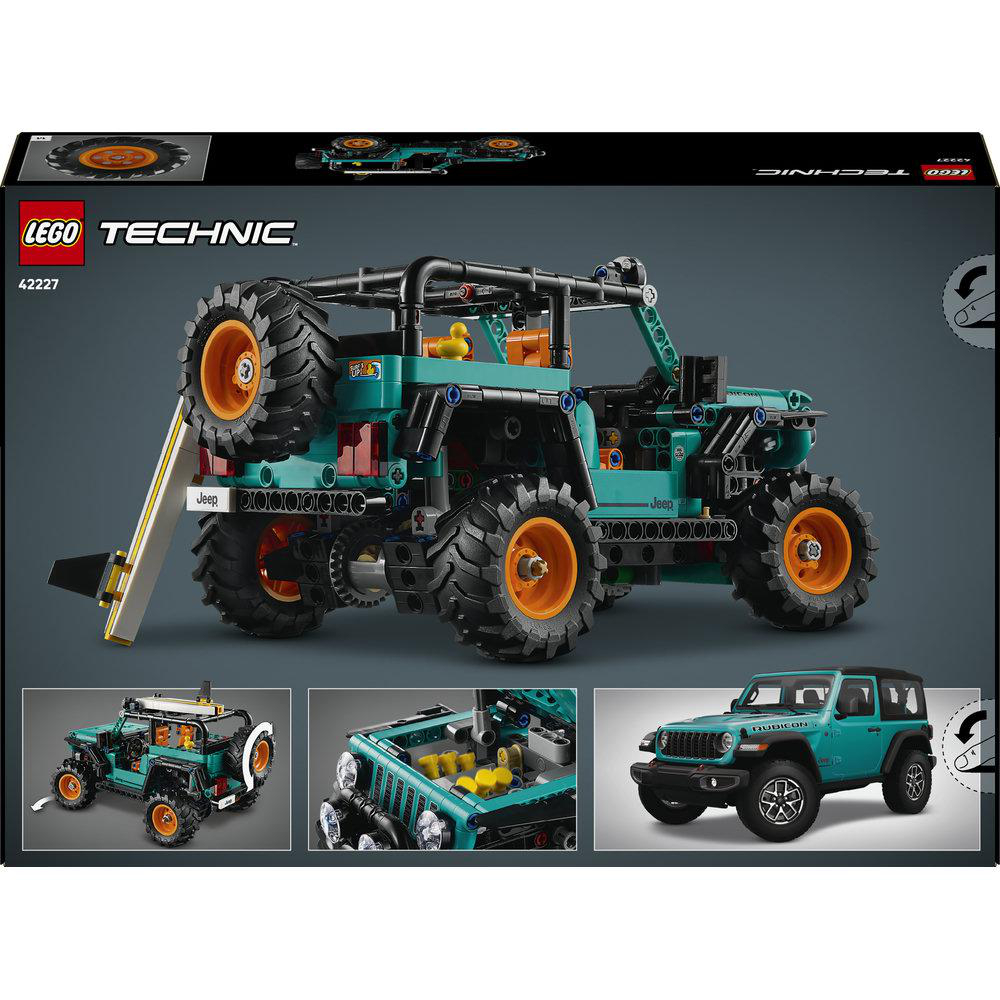 Ein grüner Lego Jeep mit großen Rädern und orangefarbenen Felgen.