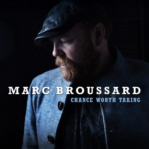 Mann mit Bart und Kappe blickt nach unten. Albumtitel: Marc Broussard.