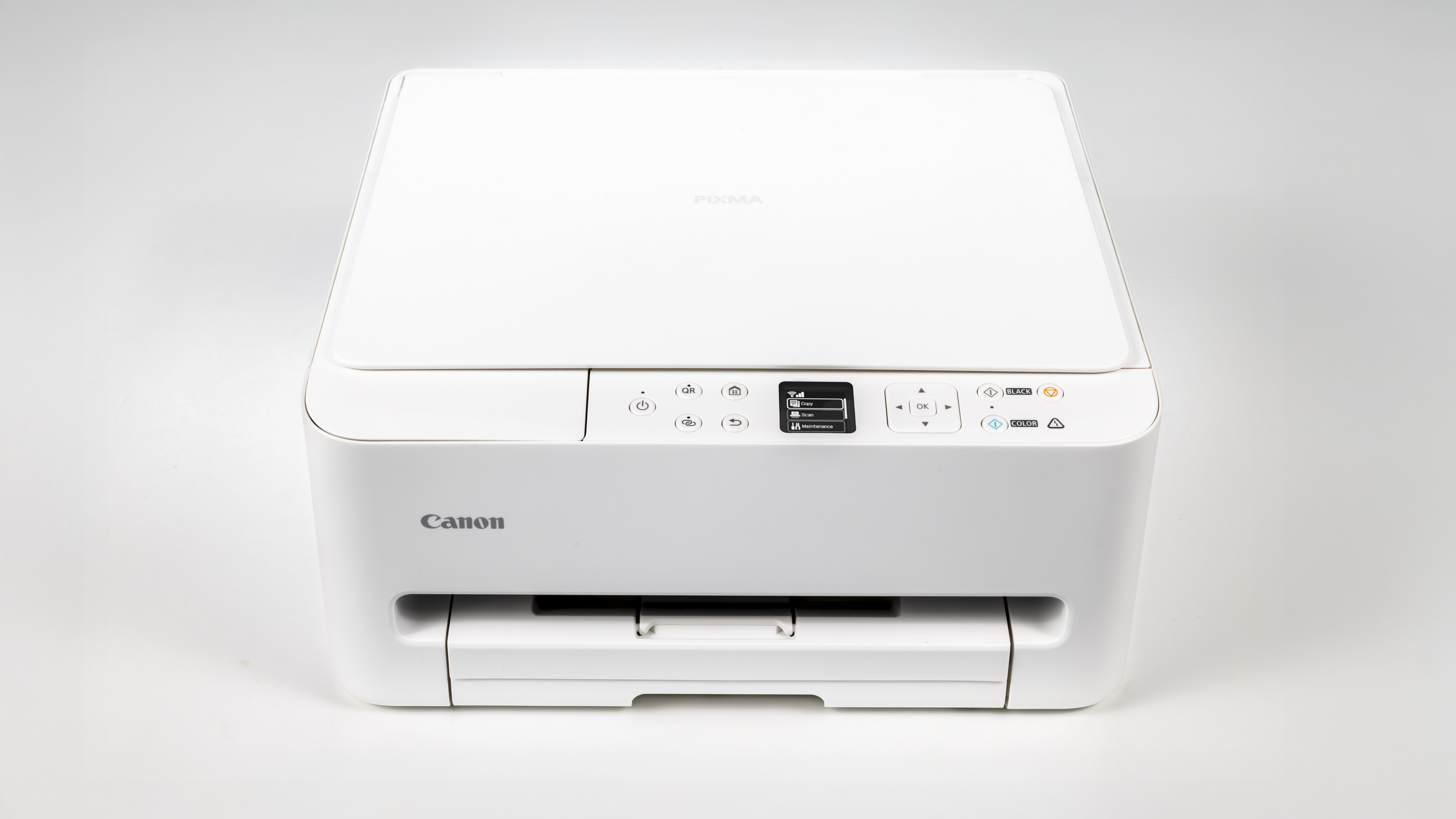Ein weißer Canon Pixma Drucker mit Tastenfeld und kleinem Bildschirm.