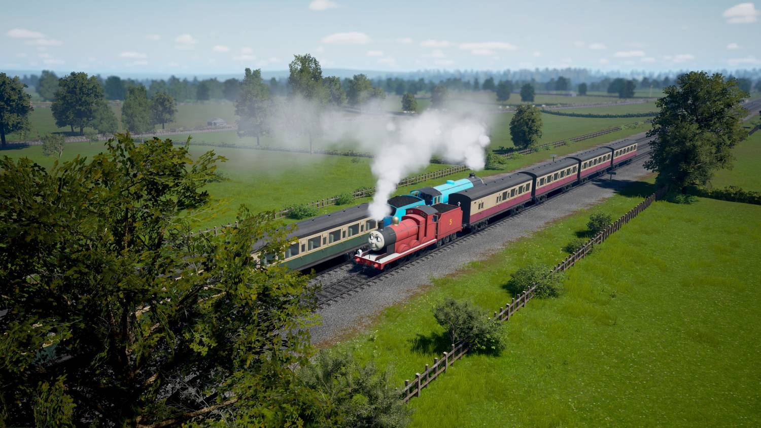 Dos trenes, rojo y azul, viajan sobre vías en un paisaje verde.