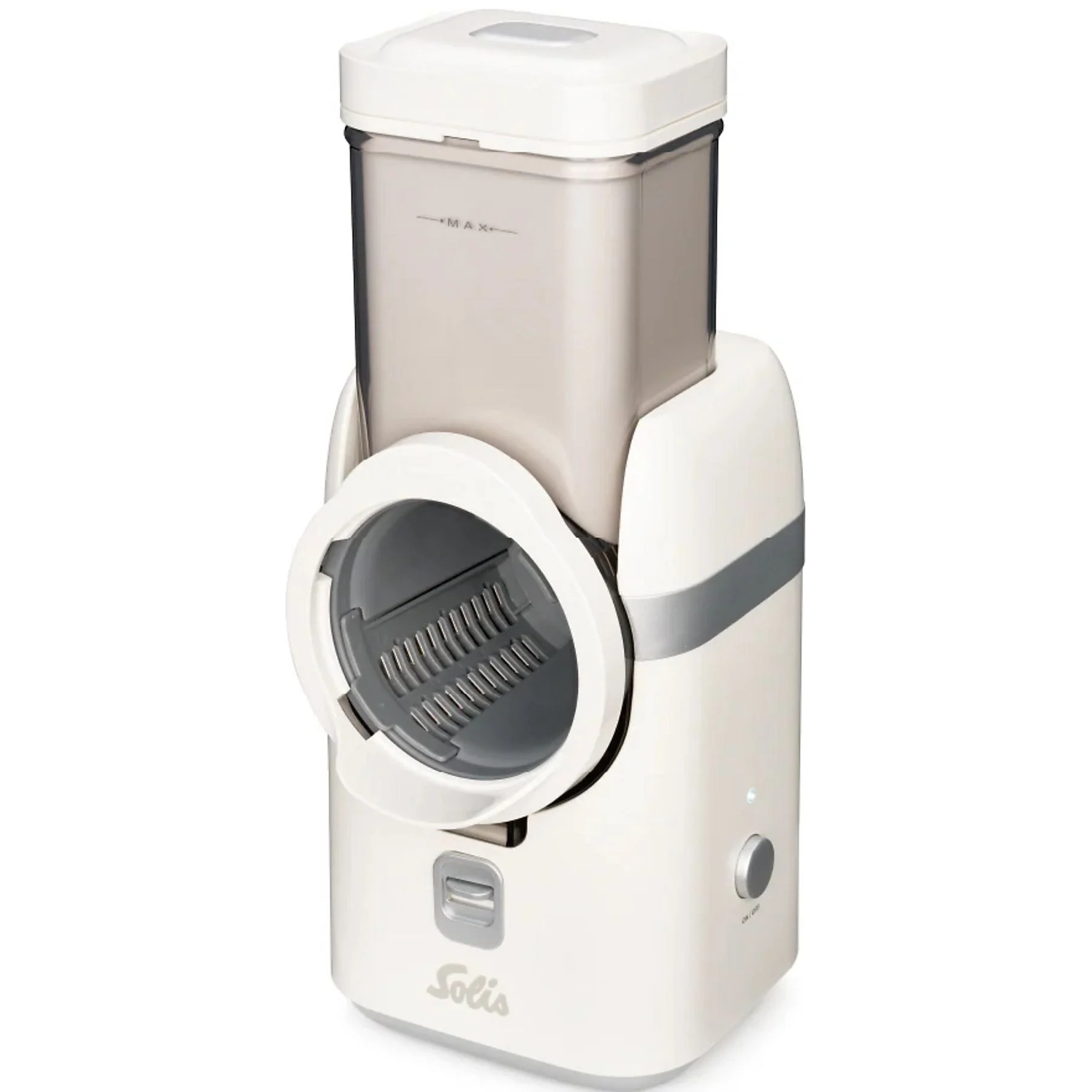 A cream-colored electric grater with silver accents and a clear container.