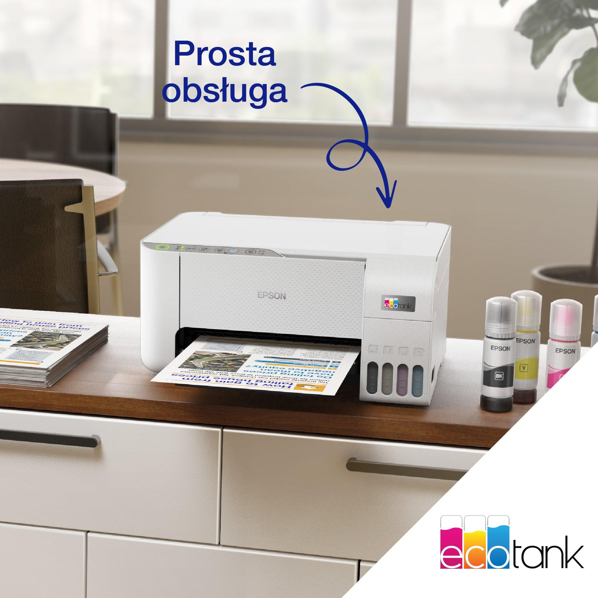 Biała drukarka Epson EcoTank z czterema butelkami z tuszem obok.