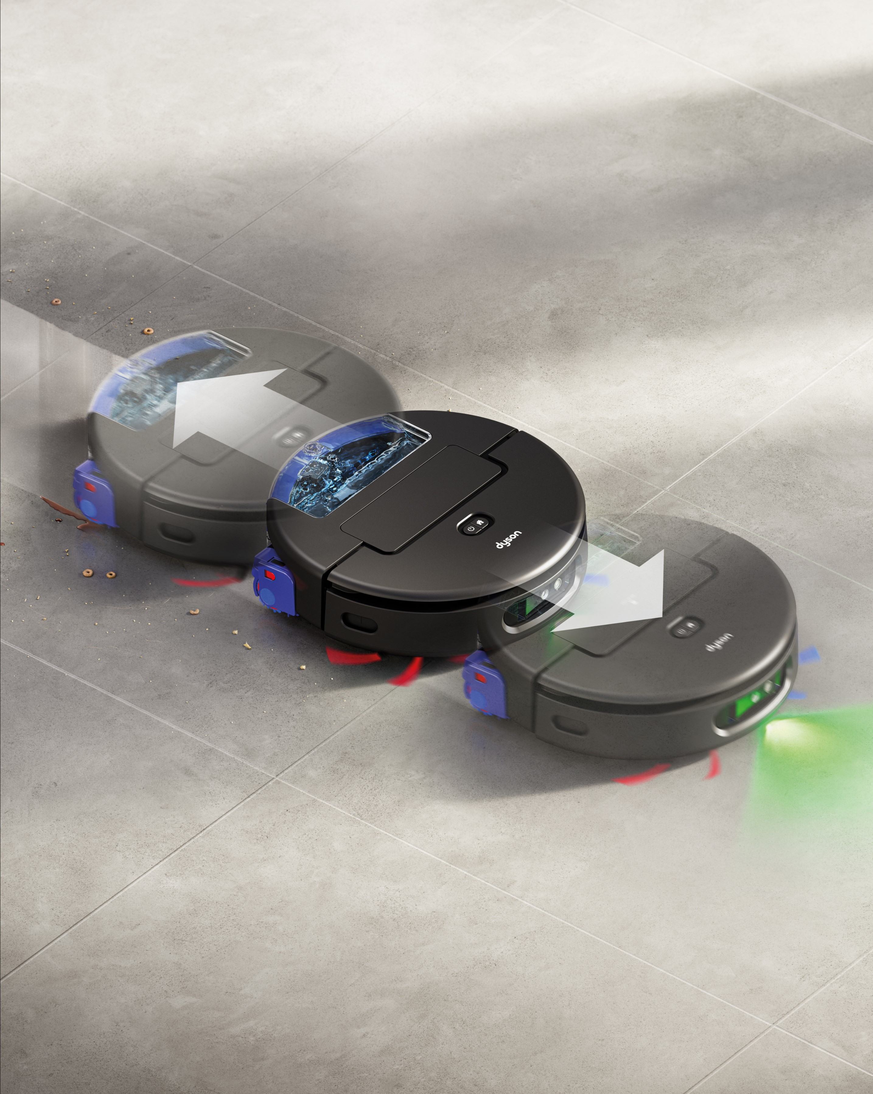 Tres aspiradoras robot Dyson negras limpian un suelo de baldosas grises.