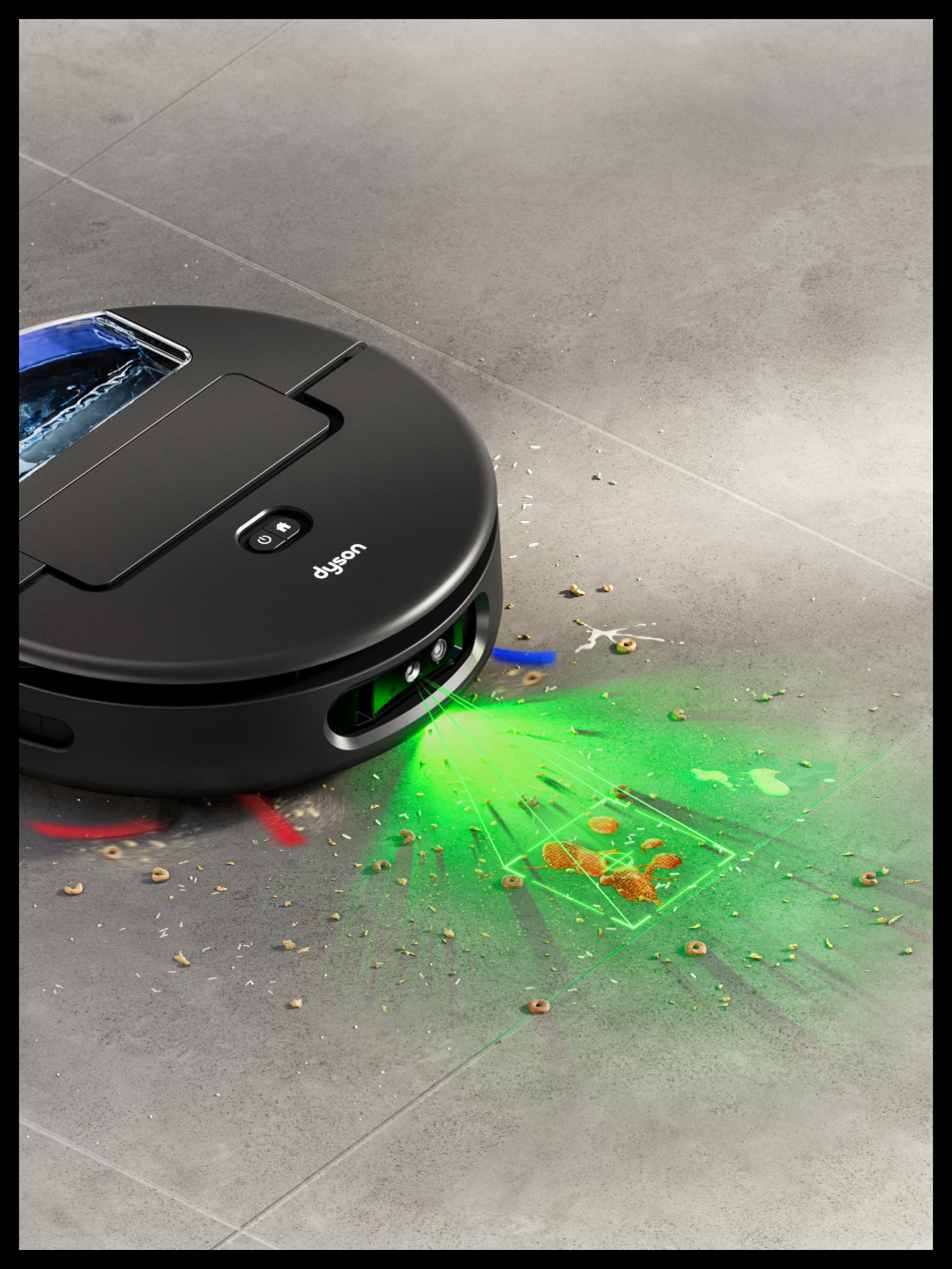 Un robot aspirador Dyson negro limpia restos de comida con láseres verdes en suelo gris.