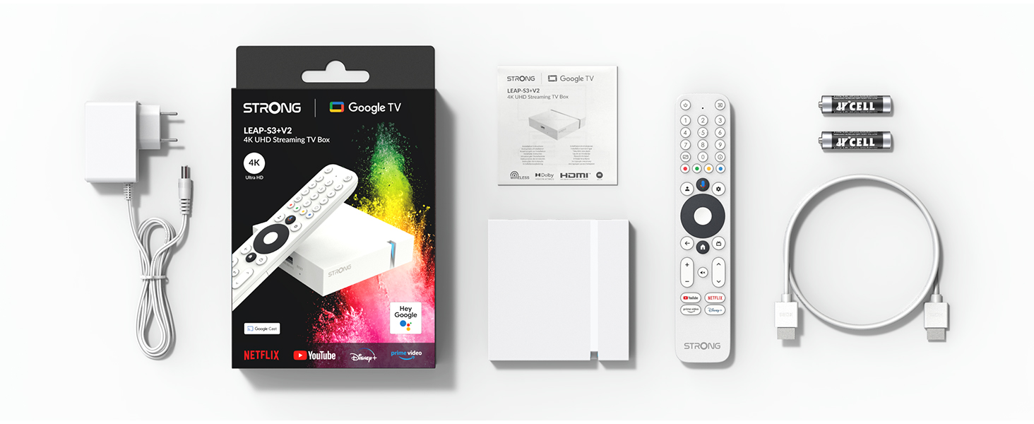 Accesorios de caja de streaming: adaptador, control remoto, baterías, cable y caja.