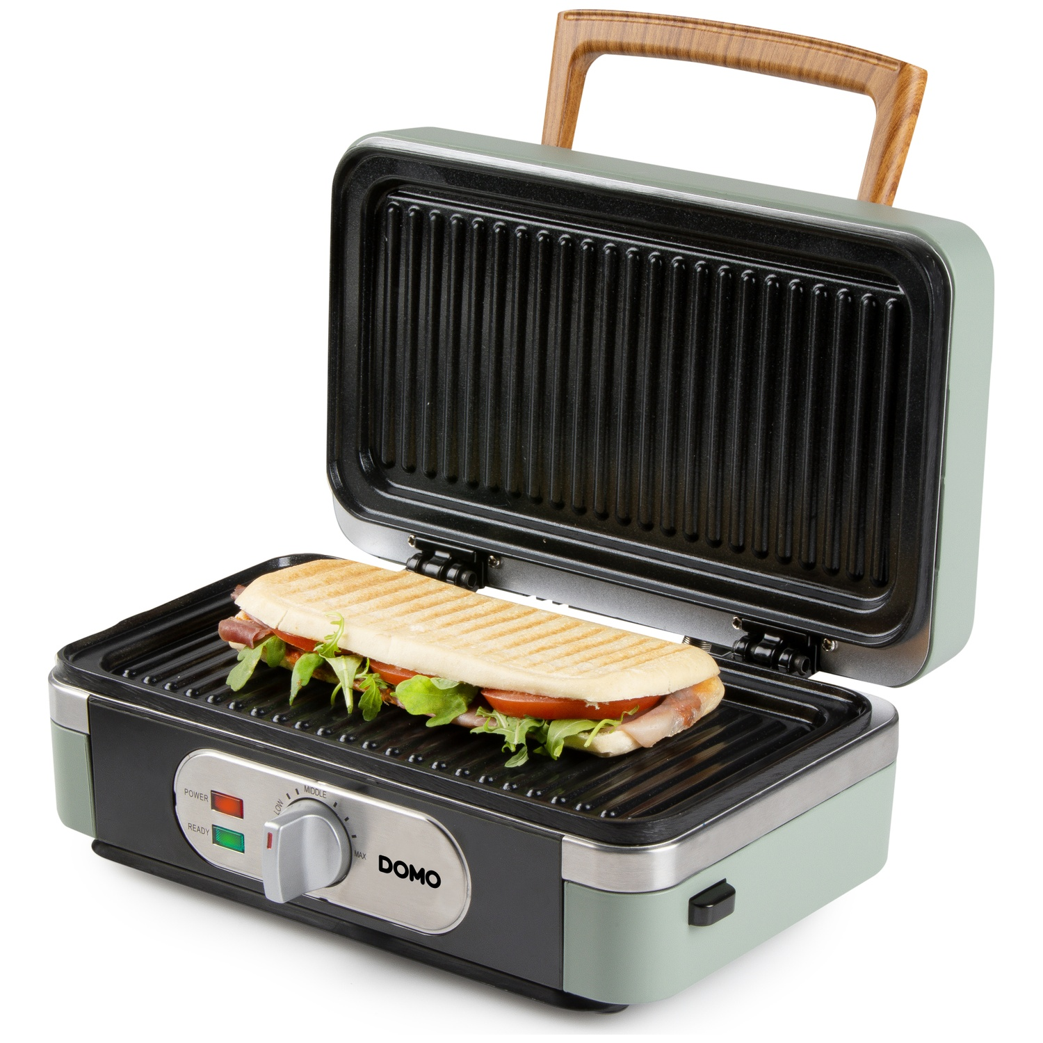 An open panini grill with a sandwich on the bottom plate. The grill is light green with a wooden handle.
