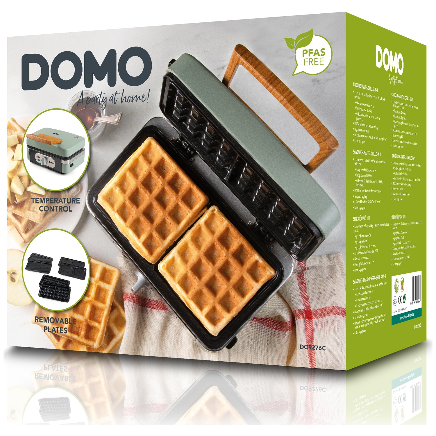 DOMO waffle maker with two finished waffles, removable plates shown.