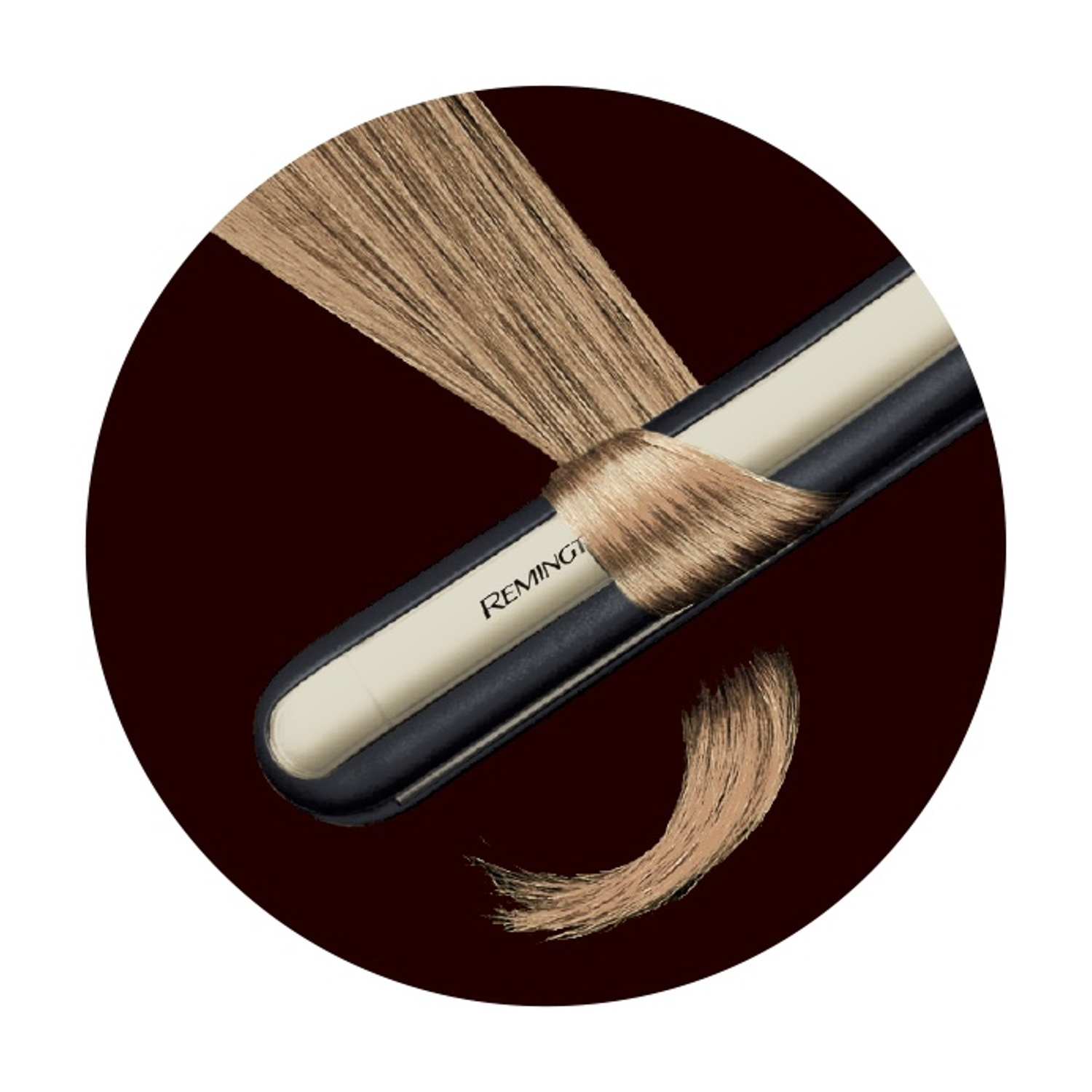 Una piastra per capelli con capelli biondi che la attraversano.