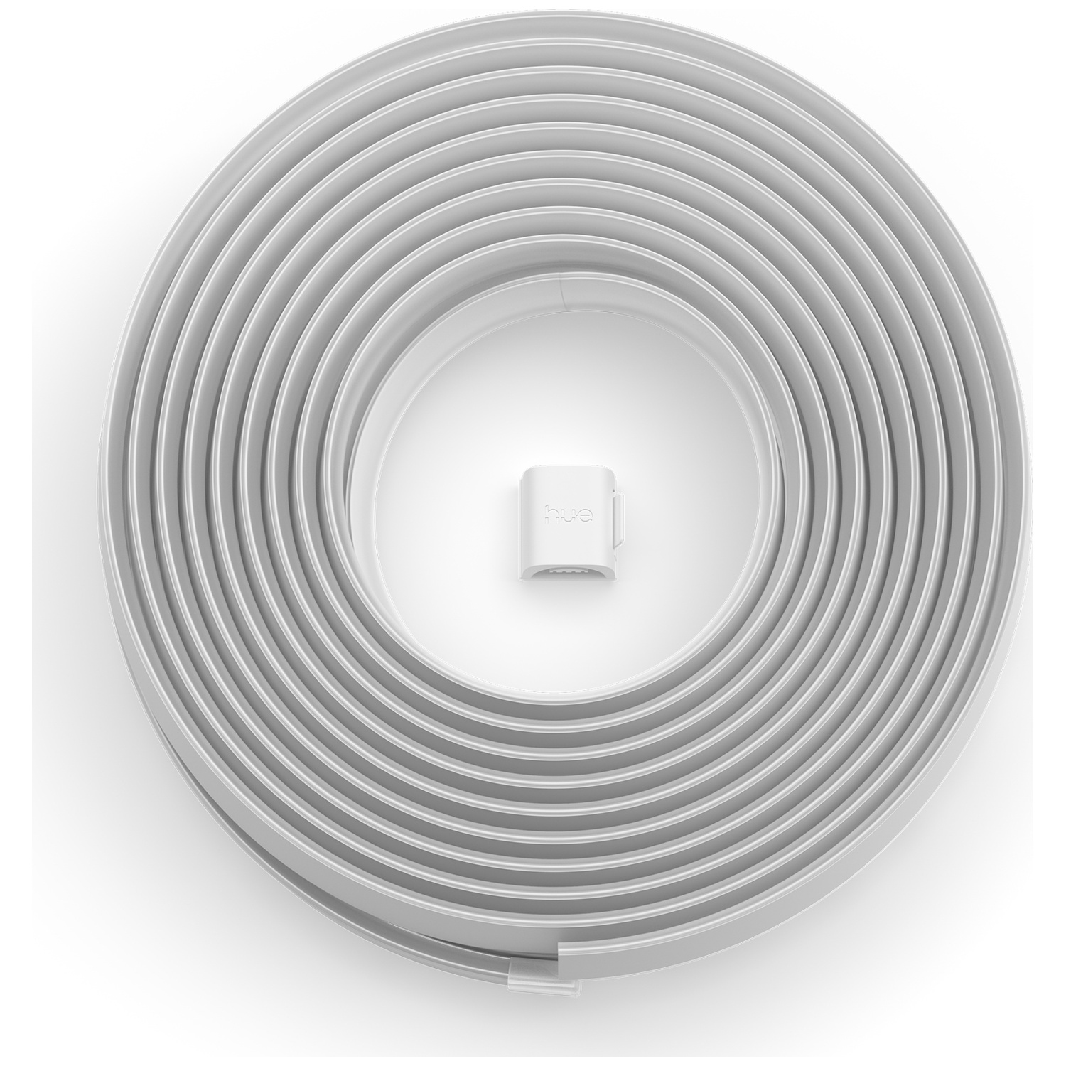 Een witte lichtstrip cirkelvormig opgerold. Een kleine witte connector met 'hue' erop in het midden.