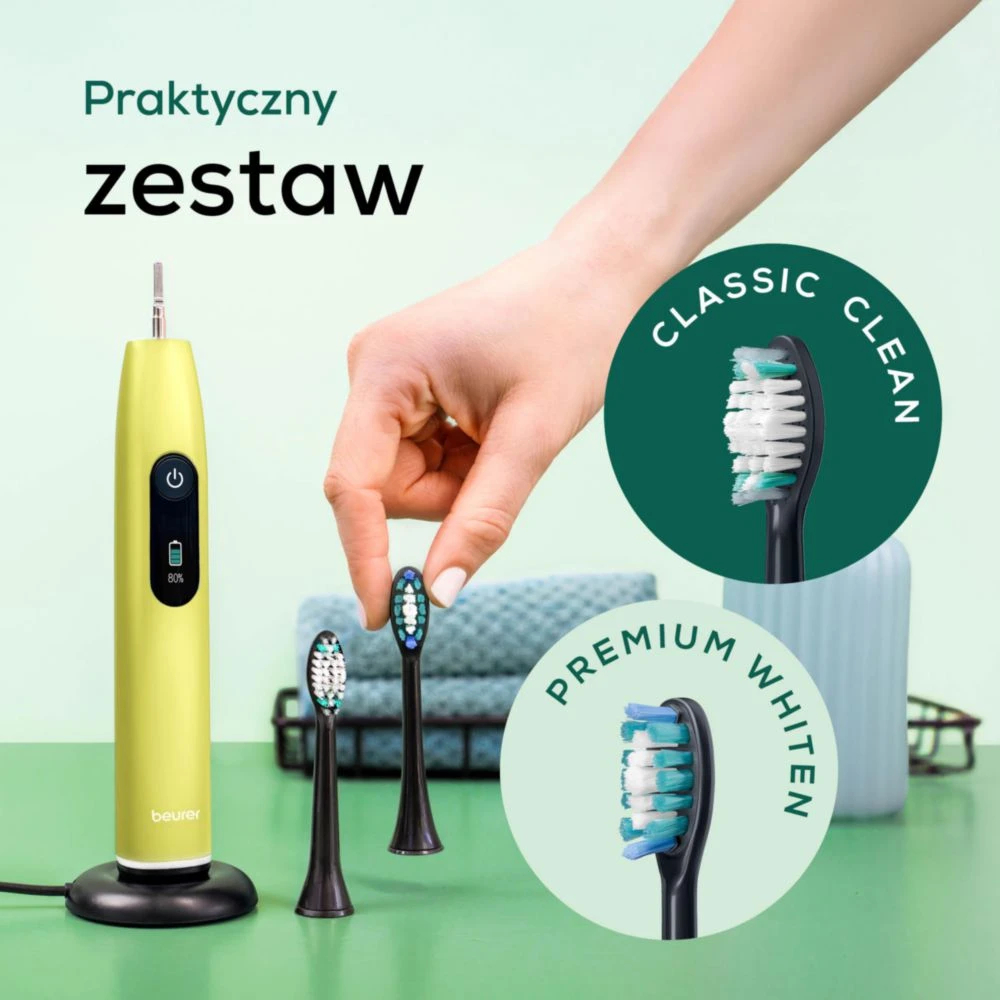 Żółty zestaw szczoteczek elektrycznych z końcówkami.