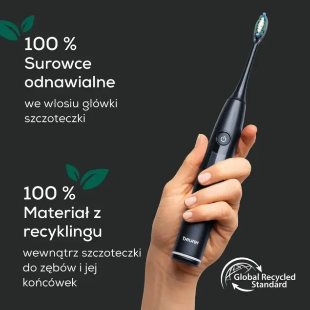 Dłoń trzymająca czarną szczoteczkę elektryczną z logo Beurer.