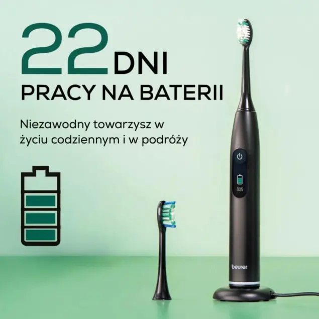 Czarna szczoteczka elektryczna ze stacją ładującą i zapasową końcówką. Ikona baterii.