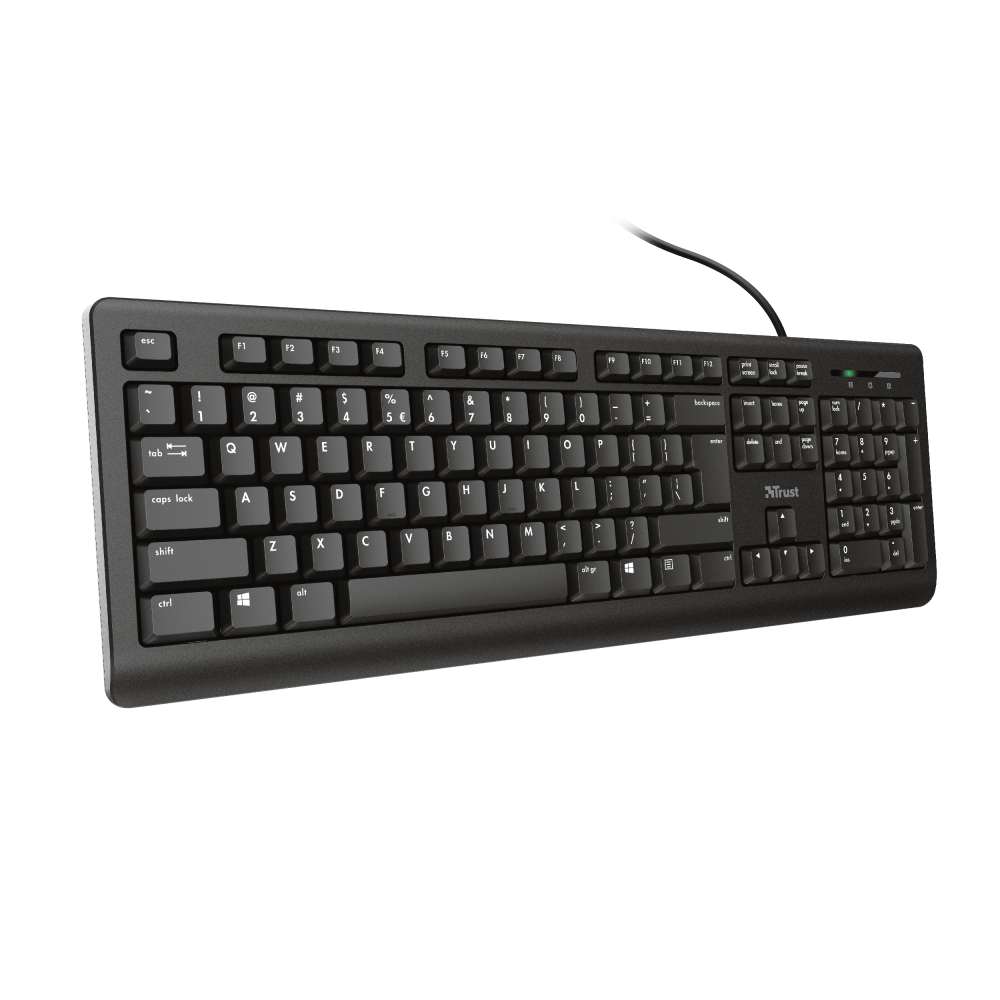 Czarna klawiatura komputerowa z kablem na czarnym tle. Widok z bliska.