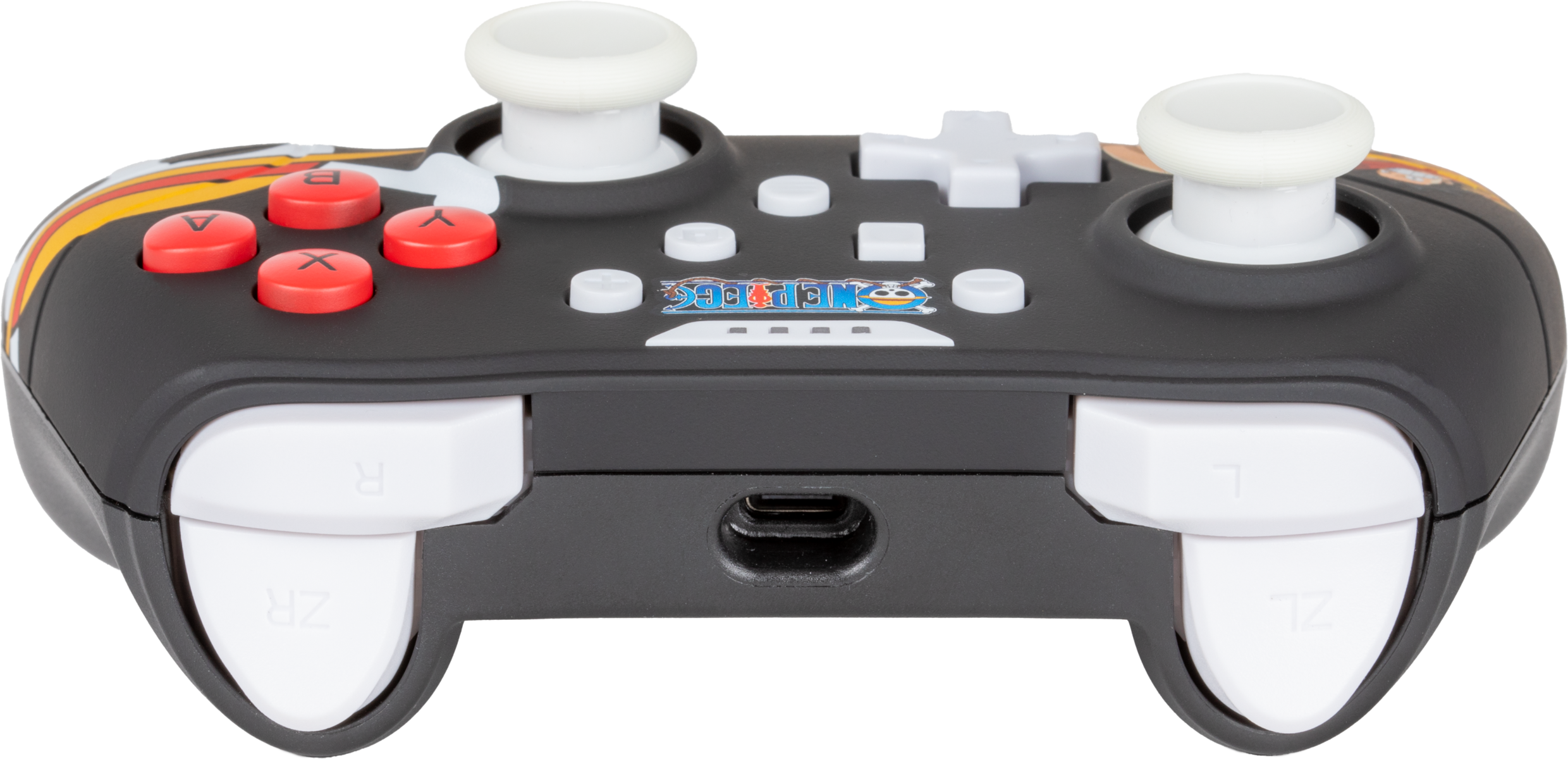 Fekete kontroller piros gombokkal és fehér joystickokkal.