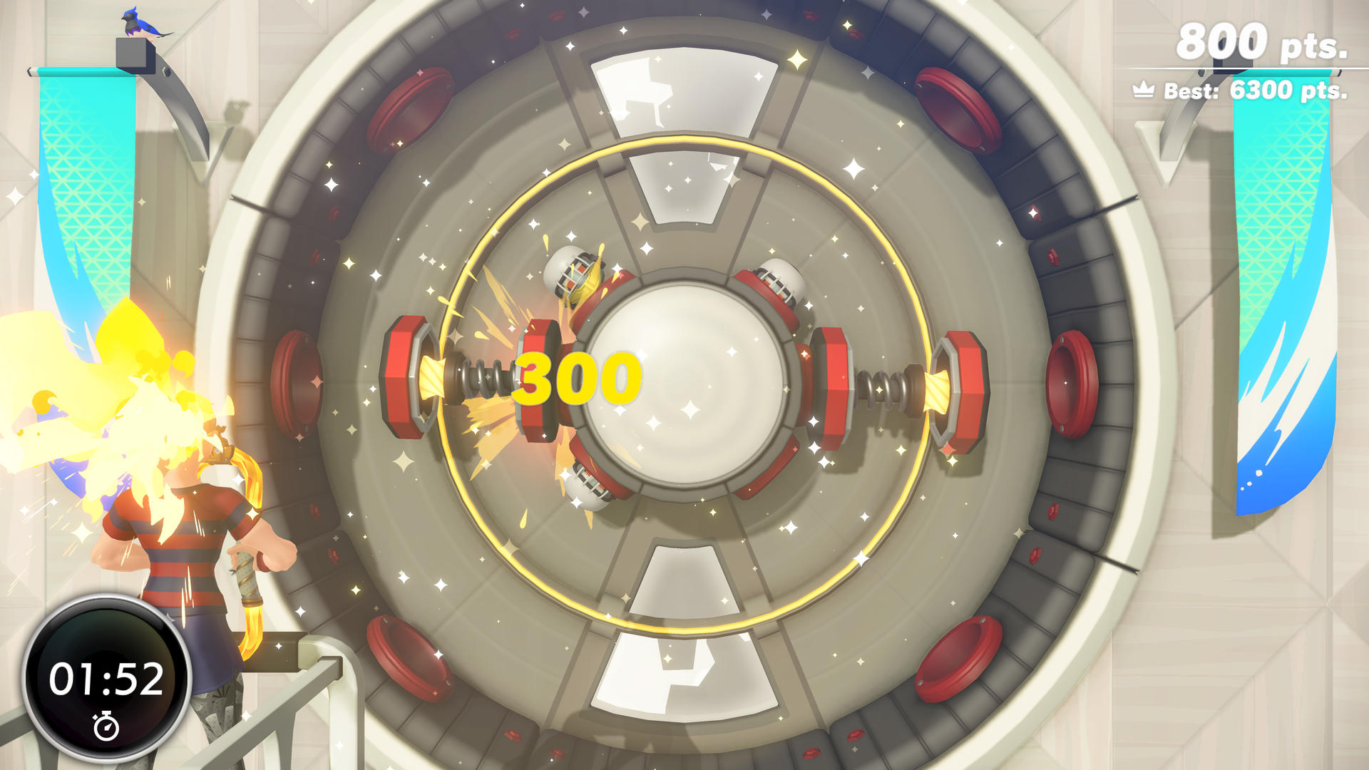 Gracz z blond włosami i pasiastą koszulką wchodzi w interakcję z okrągłym urządzeniem.