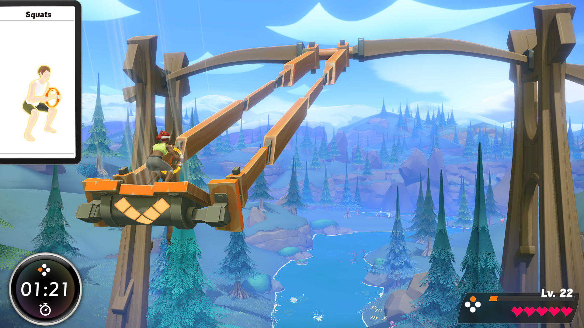 Osoba na tyrolce trzyma pierścień. Zegar cyfrowy pokazuje 01:21.