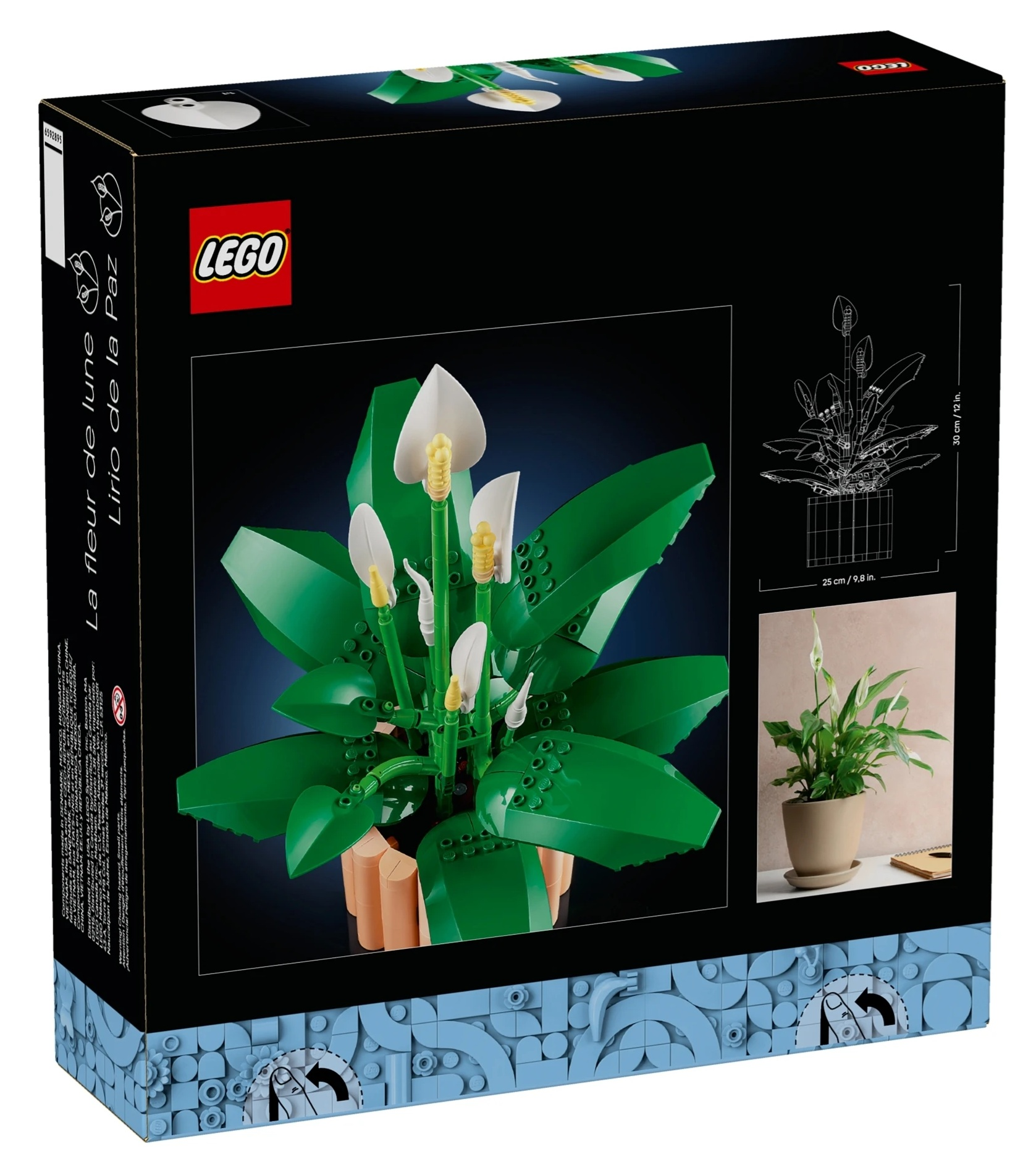 Zestaw Lego zielonej skrzydłokwiatu z białymi kwiatami i żółtymi pręcikami.