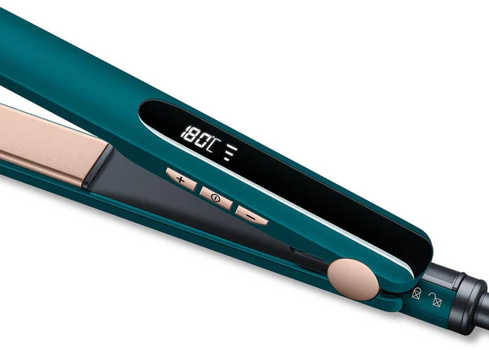 Turkusowa prostownica pokazująca cyfrową temperaturę 180°C.