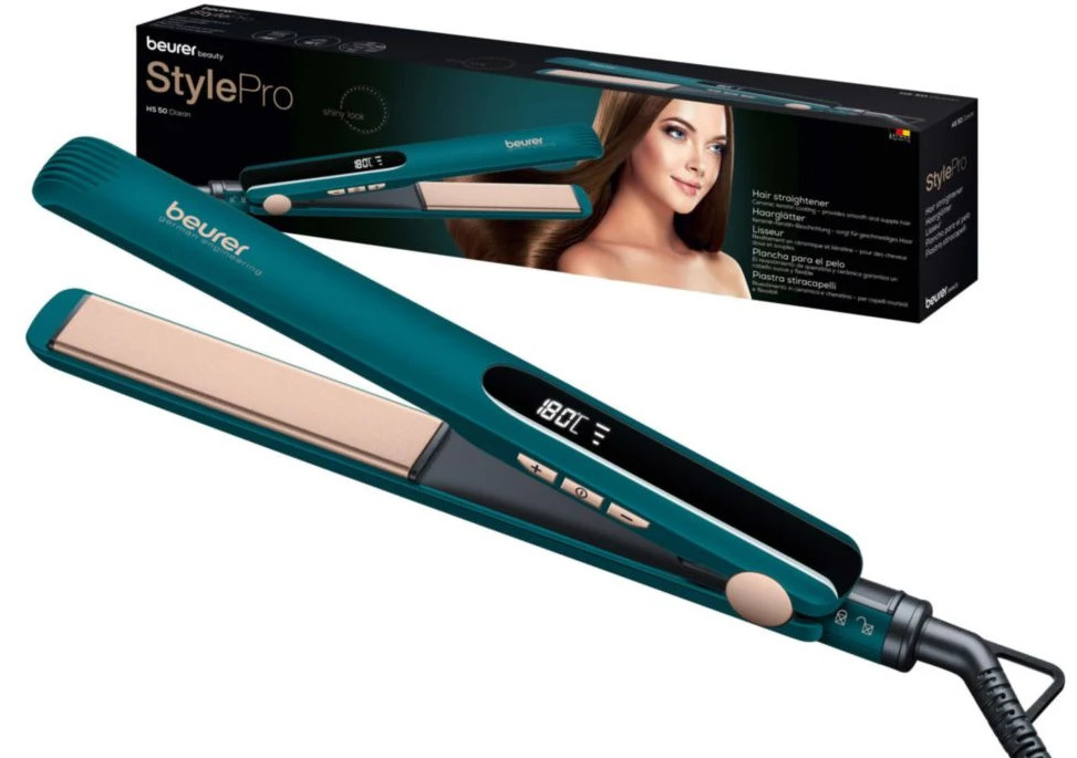 Turkusowa prostownica Beurer z cyfrowym wyświetlaczem i złotymi płytkami.