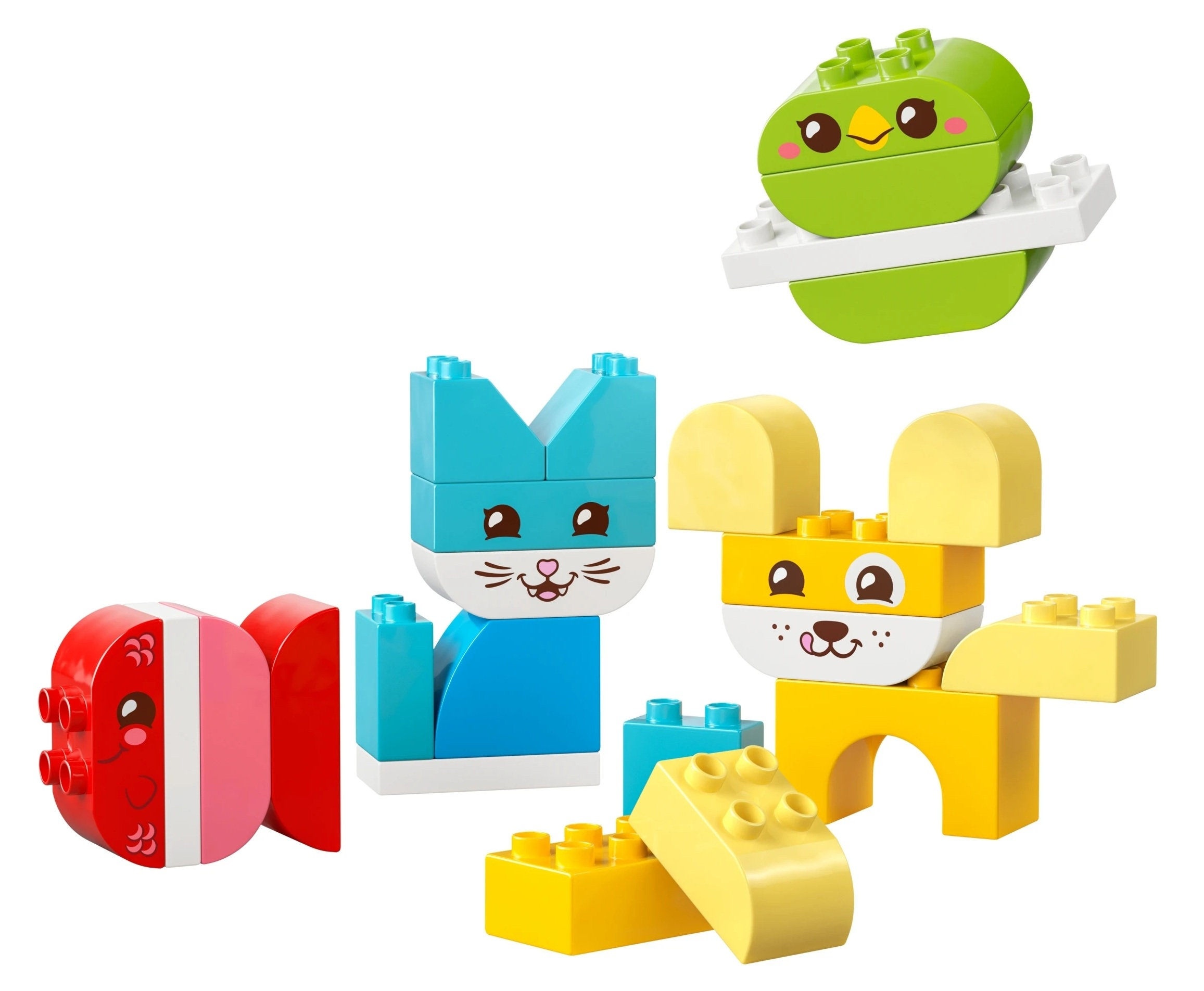 Kolorowe figurki Duplo: ptak, kot, pies i serce.