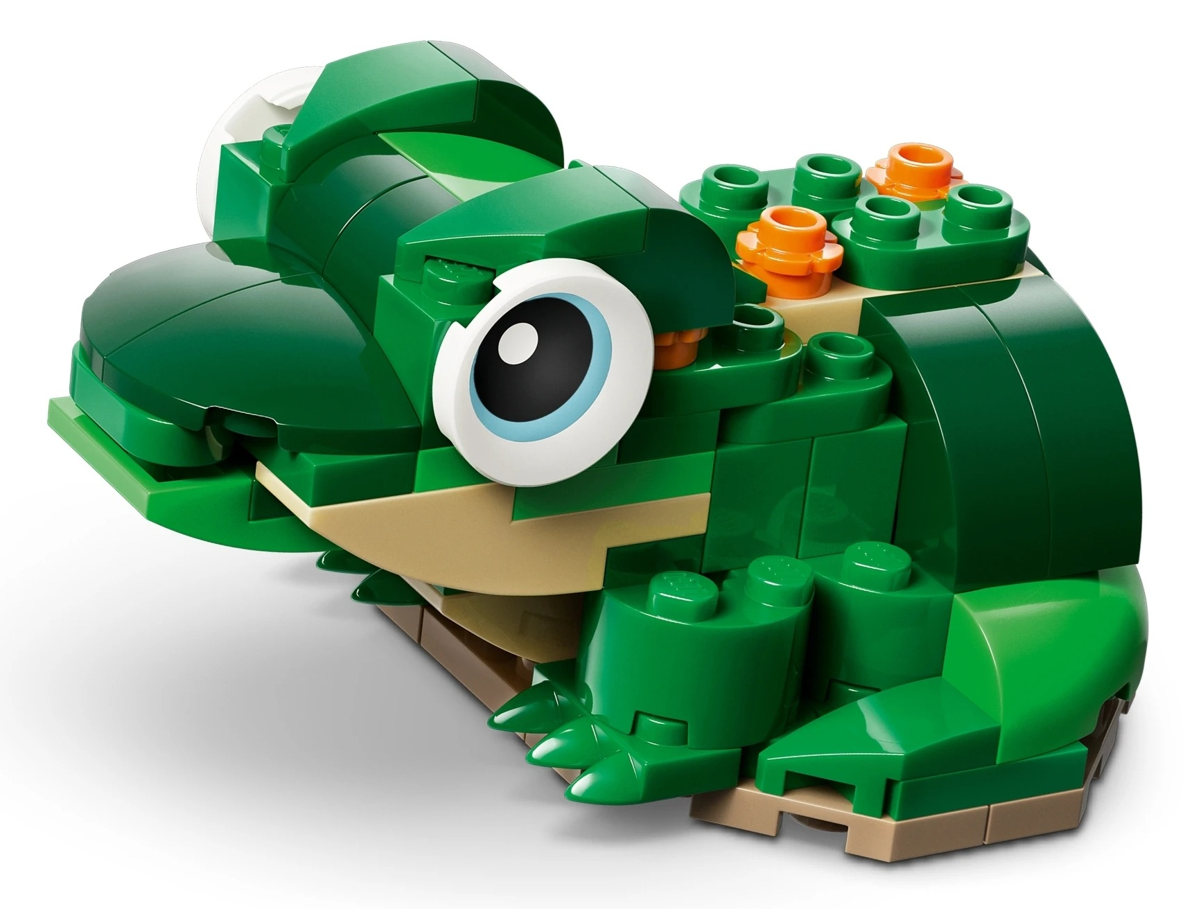 Zielona żaba z klocków Lego z dużym okiem, pomarańczowymi detalami i nogami.