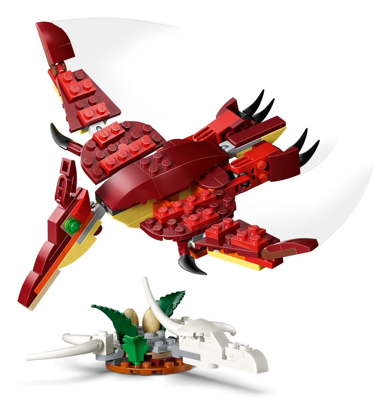 Czerwony smok Lego leci nad małym gniazdem z jajkami i białym szkieletem.