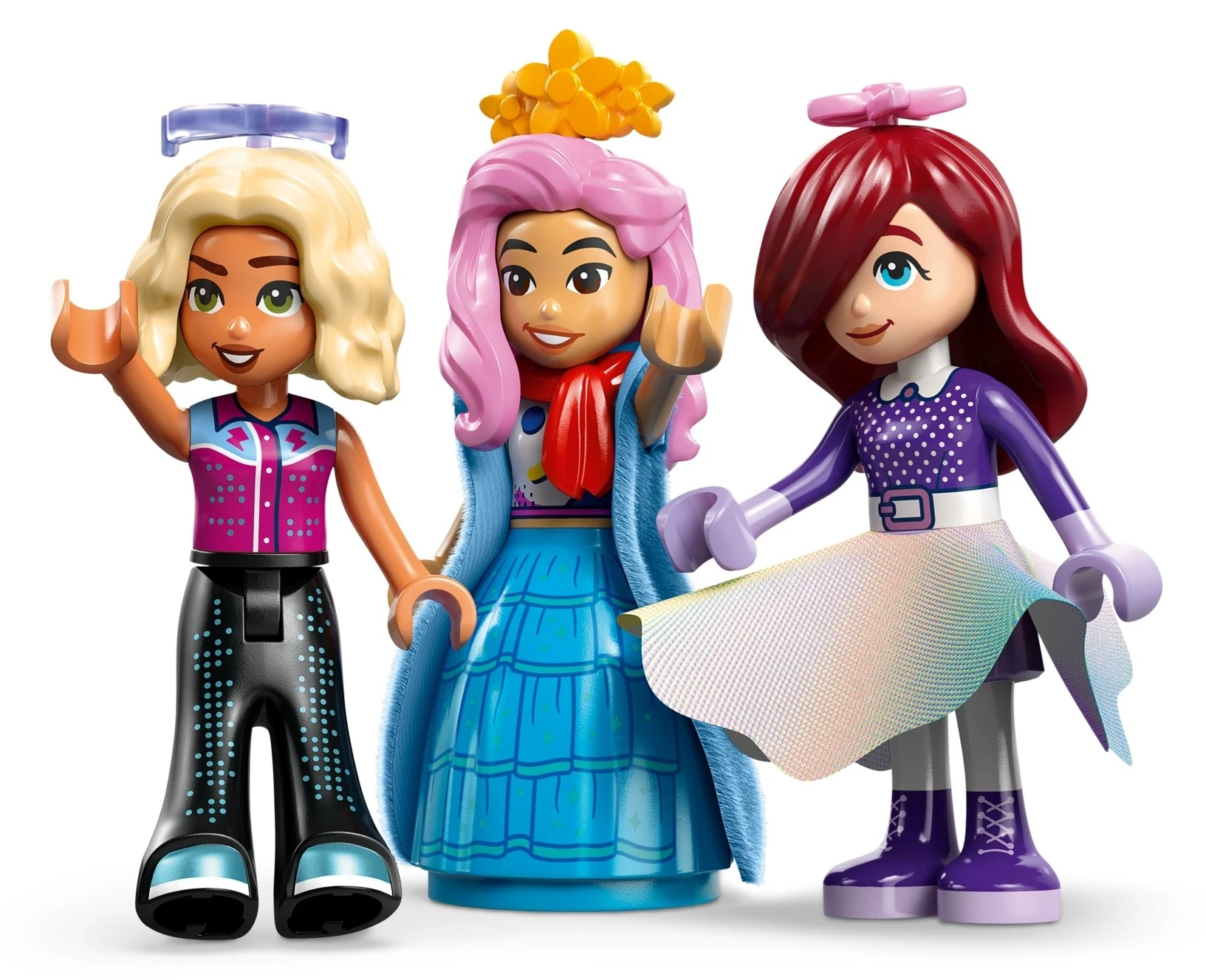 Trzy przyjaciółki Lego stoją obok siebie. Od lewej do prawej: blondynka, różowowłosa, rudowłosa.