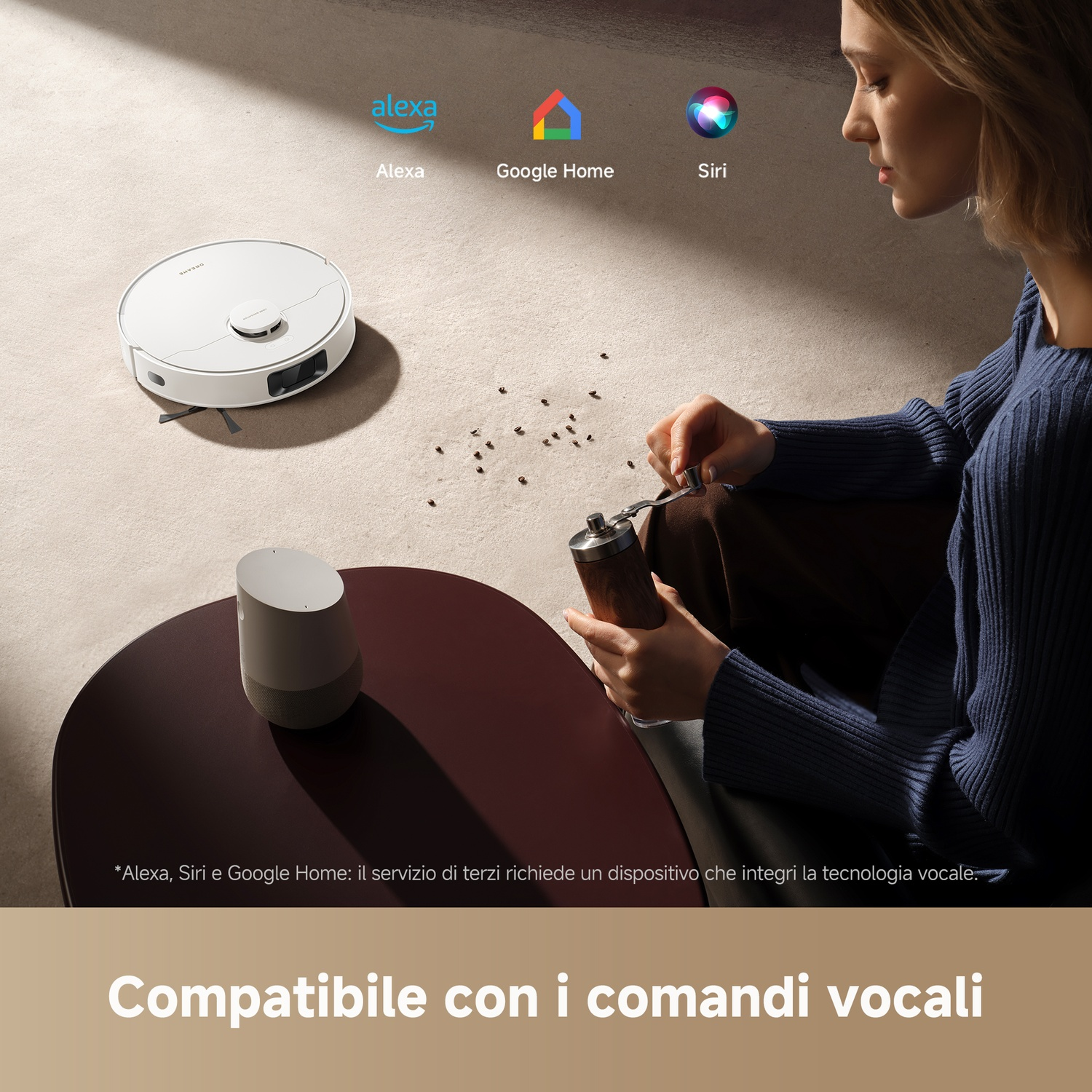 Un robot aspirapolvere bianco vicino a uno smart speaker e una donna.