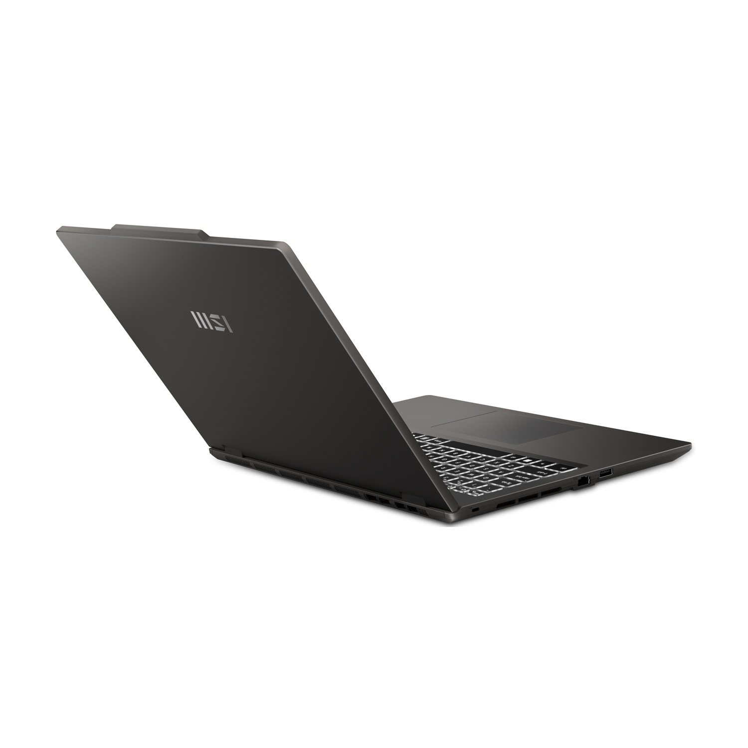 Un laptop chiuso e scuro con logo MSI. Tastiera visibile.