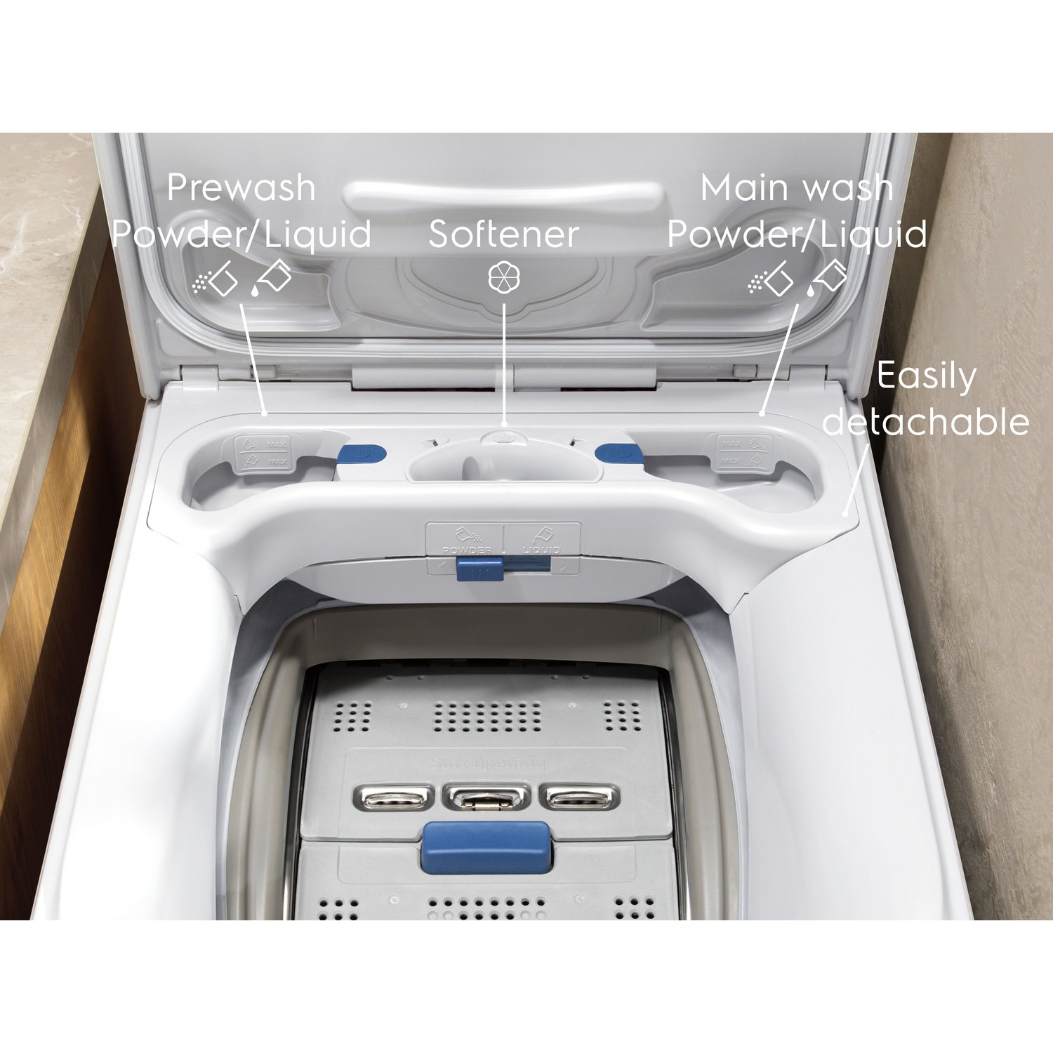 Cassetto detersivo lavatrice con scomparti per prelavaggio, ammorbidente e lavaggio principale.