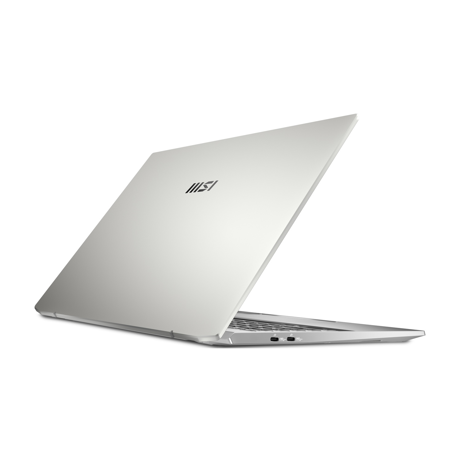 Un laptop argentato con logo MSI, visto di lato.