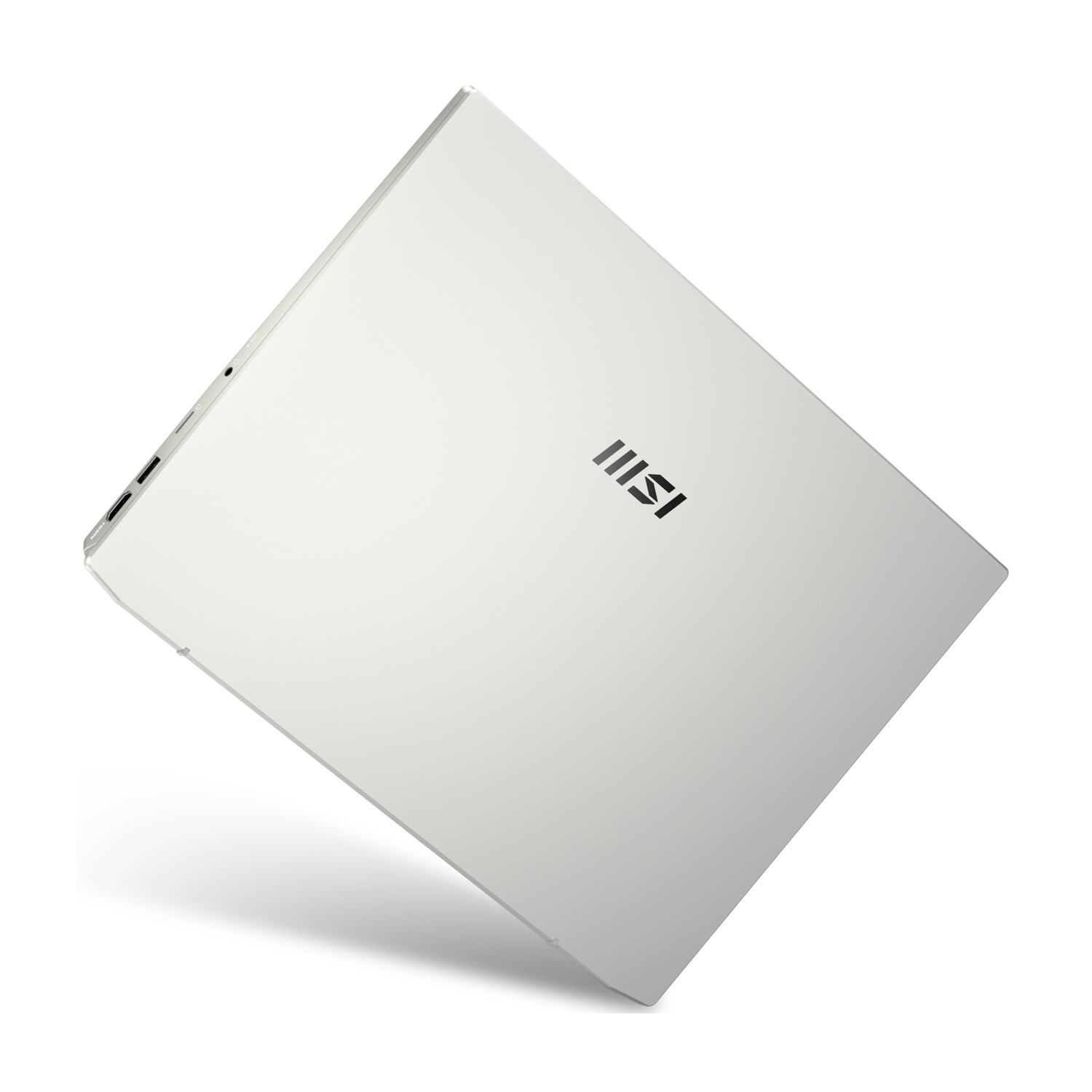 Un laptop MSI argentato chiuso con il suo logo sul coperchio.