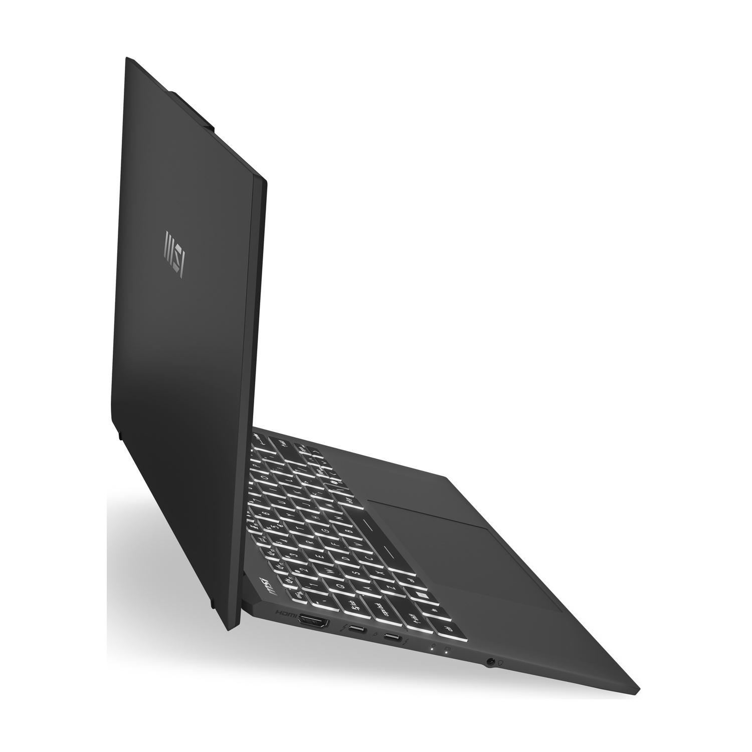 Un laptop MSI nero è aperto, mostra la tastiera con tasti argentati.