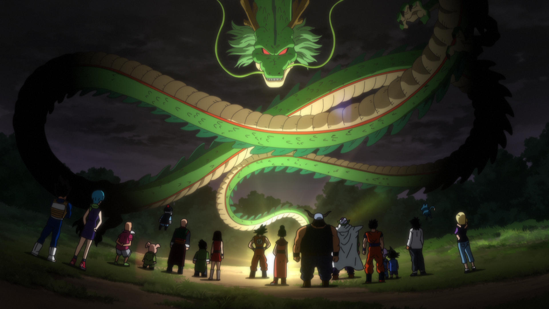 Ein riesiger grüner Drache mit roten Augen ragt über eine Gruppe verschiedener Charaktere in einer dunklen Außenumgebung.