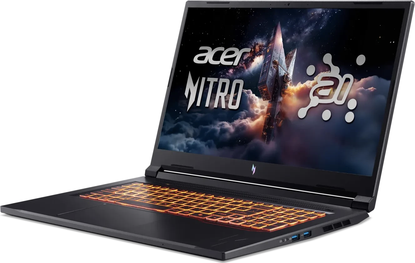 Egy fekete laptop világító billentyűzettel és űrtémájú háttérképpel.
