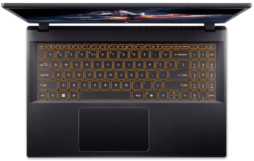 Nyitott fekete laptop háttérvilágítású billentyűzettel és képpel a képernyőn.