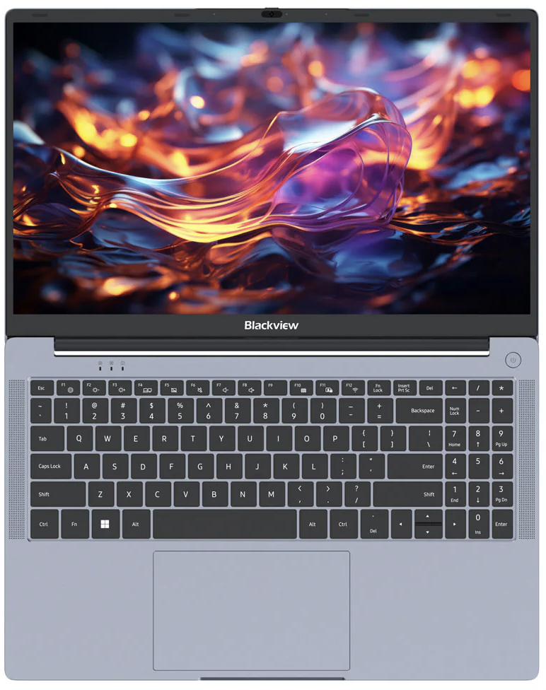 Egy nyitott laptop színes, absztrakt háttérképpel a képernyőn.