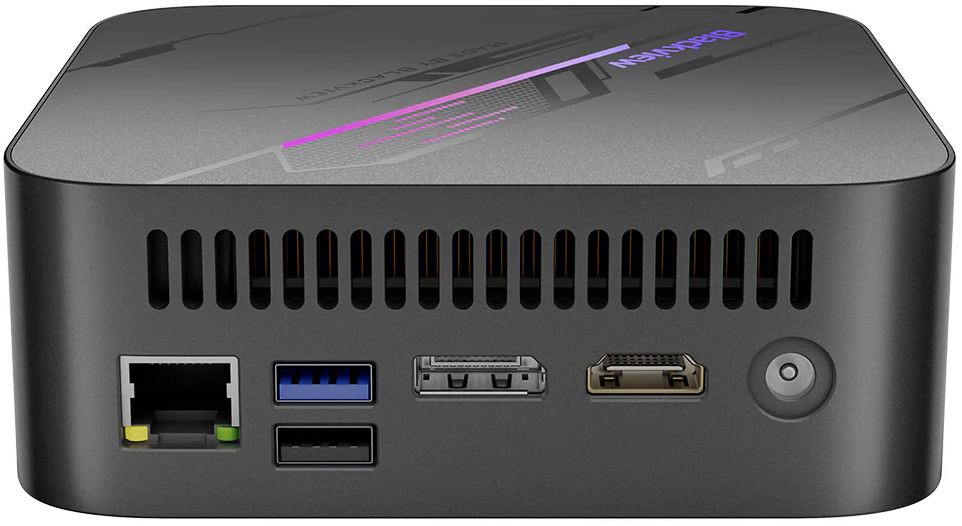 Egy fekete mini PC szellőzőnyílásokkal és Ethernet, HDMI csatlakozókkal.