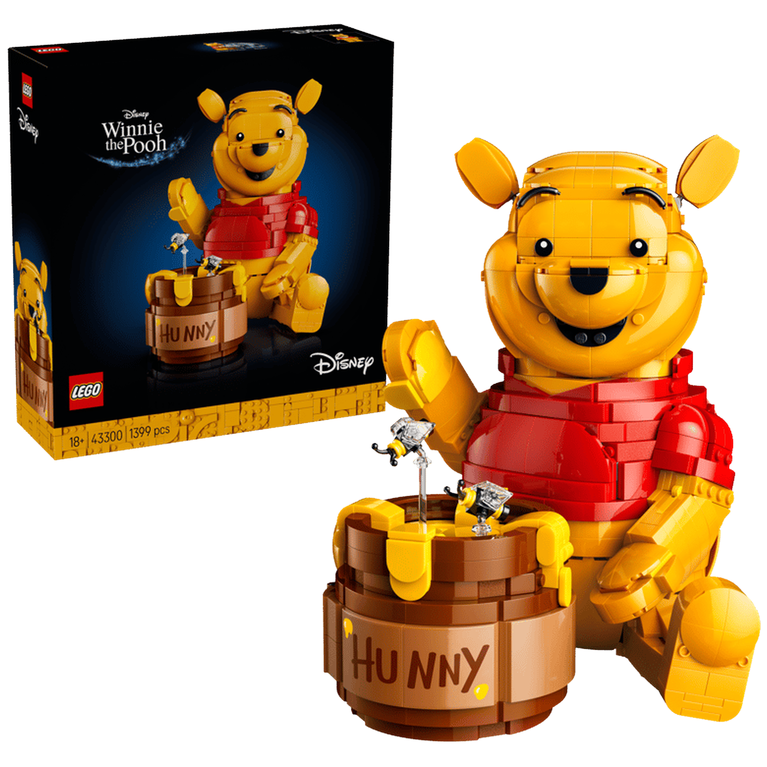 LEGO Winnie de Poeh met honingpot, inclusief doos en model. Bijen zweven boven honing.