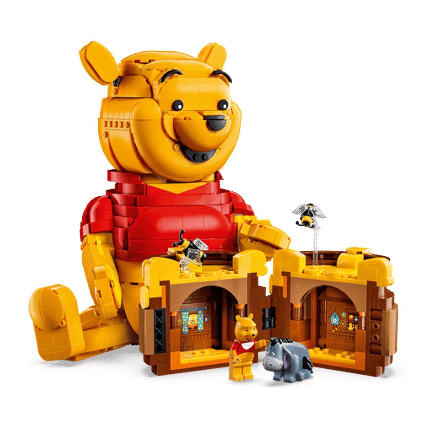Een Lego-bouwsel van Winnie de Poeh, Knorretje, Iejoor en bijen in een boshuis.