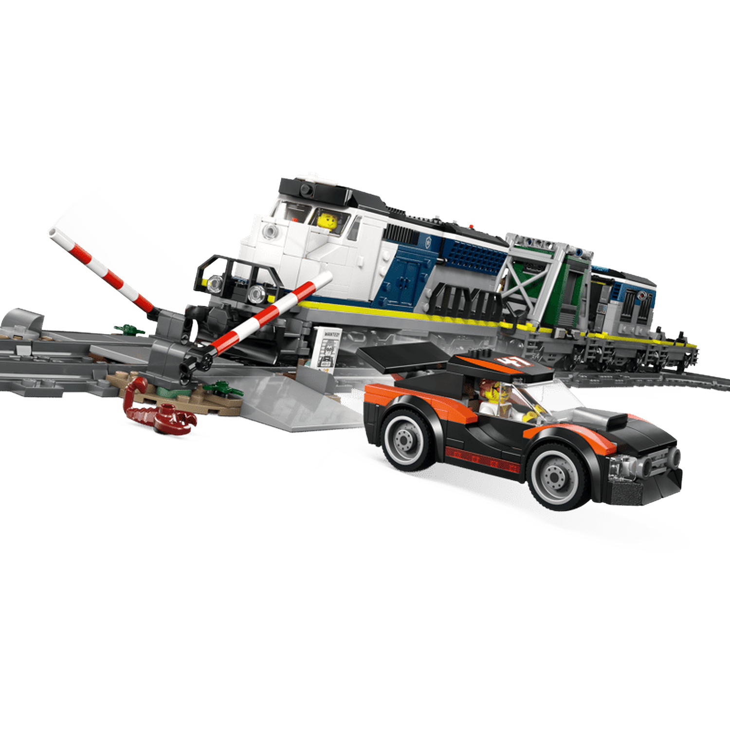 A Lego train crosses a railroad crossing as a sports car drives underneath.