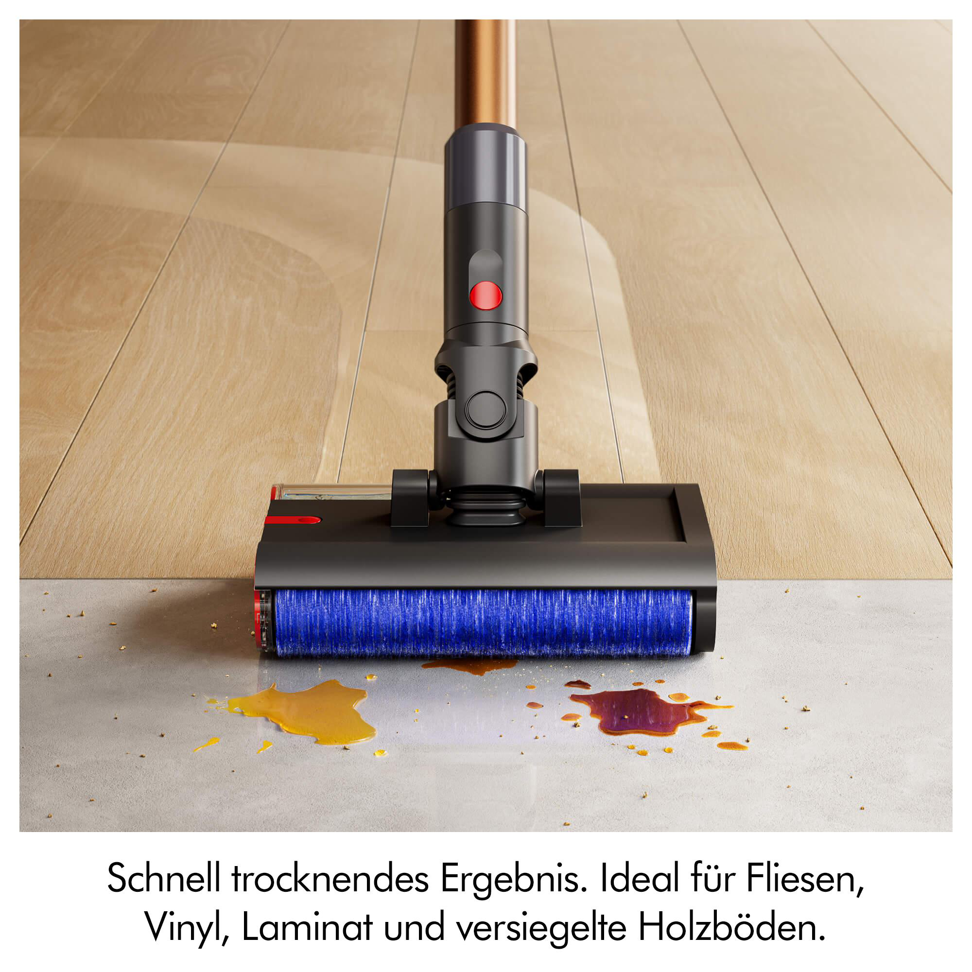 Staubsaugerbürste reinigt Flüssigkeit auf Fliesen und Holz.