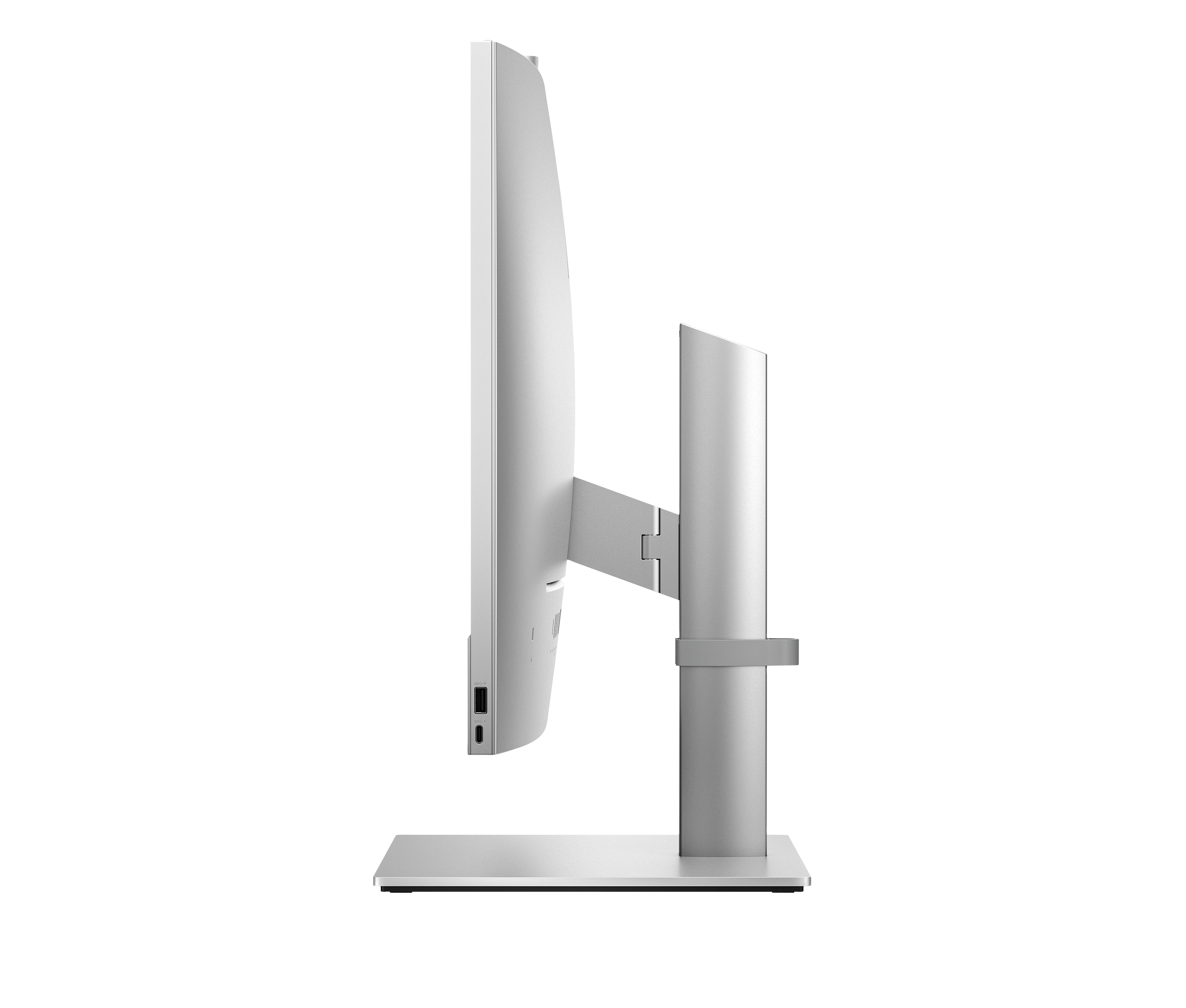 Silberner Computermonitor von der Seite mit USB-Anschlüssen.