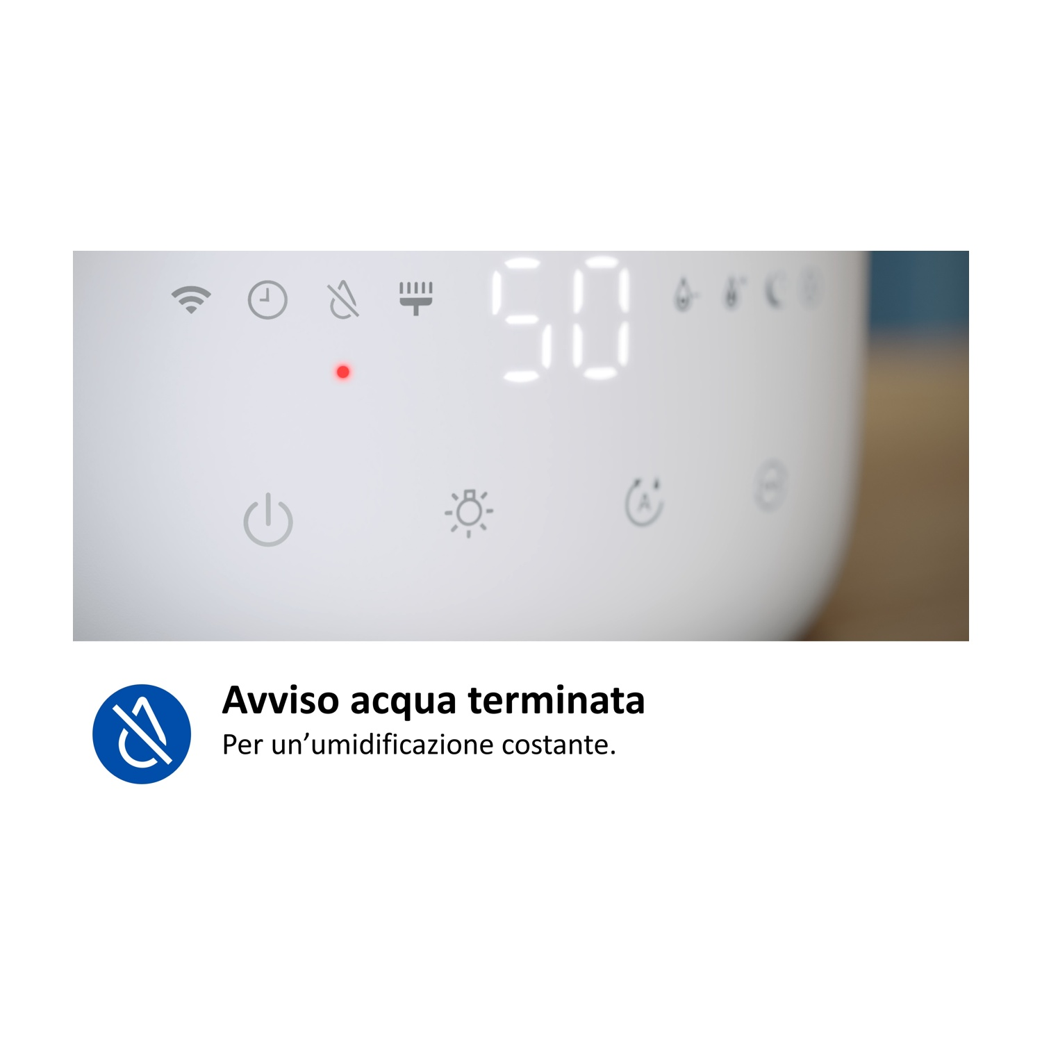 Un dispositivo bianco con display digitali. Un punto rosso è illuminato.