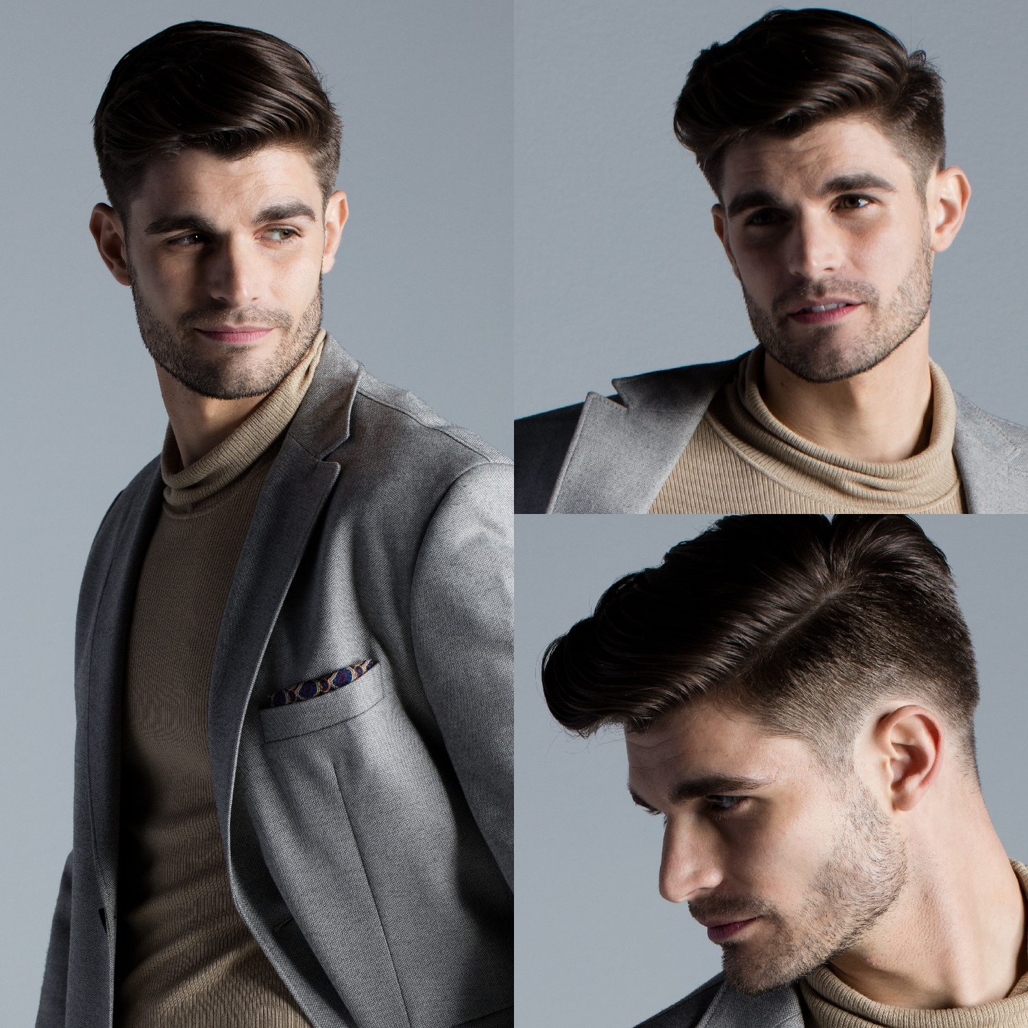 Un uomo con capelli castani indossa un dolcevita beige e un blazer grigio.