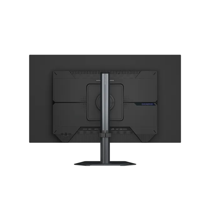 La parte trasera de un monitor negro con soporte plateado. El logo de Gigabyte es visible.