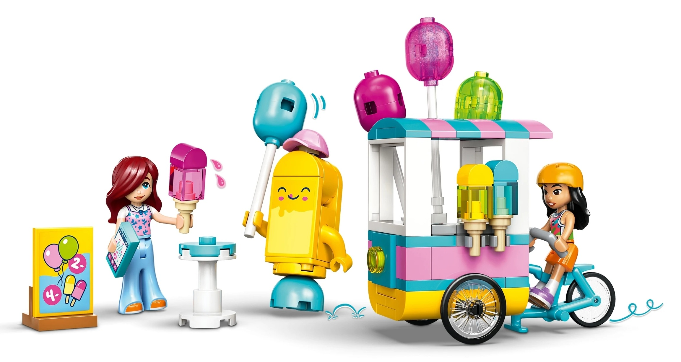 Kolorowe figurki Lego z wózkiem na lody, lodami i rowerem na białym tle.
