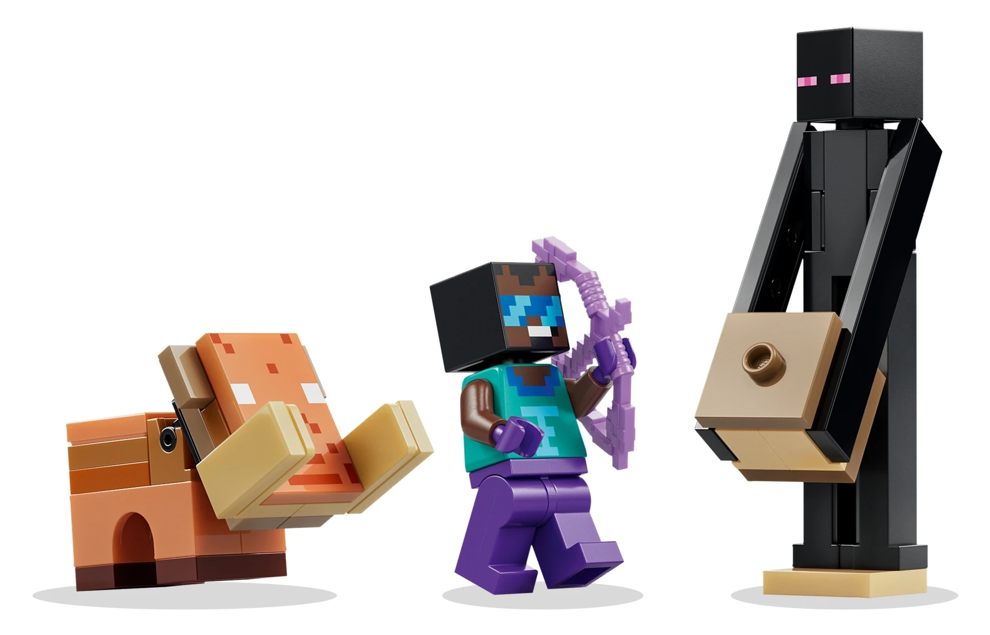Świnia, postać z łukiem i figurka Ender Dragona z Lego.